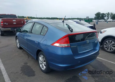2010 Honda Insight Ex from USA, damaged, VIN JHMZE2H71AS017982
